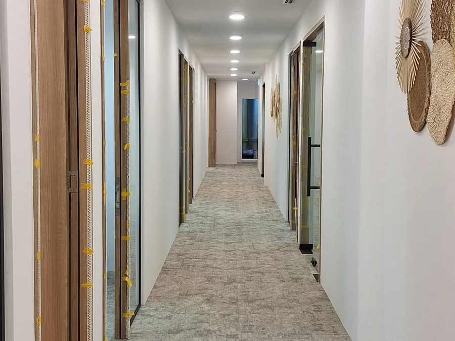 Office corridor lined with private offices