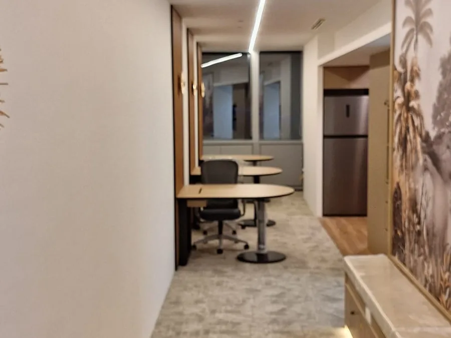 Office breakout area with feature wall and seating